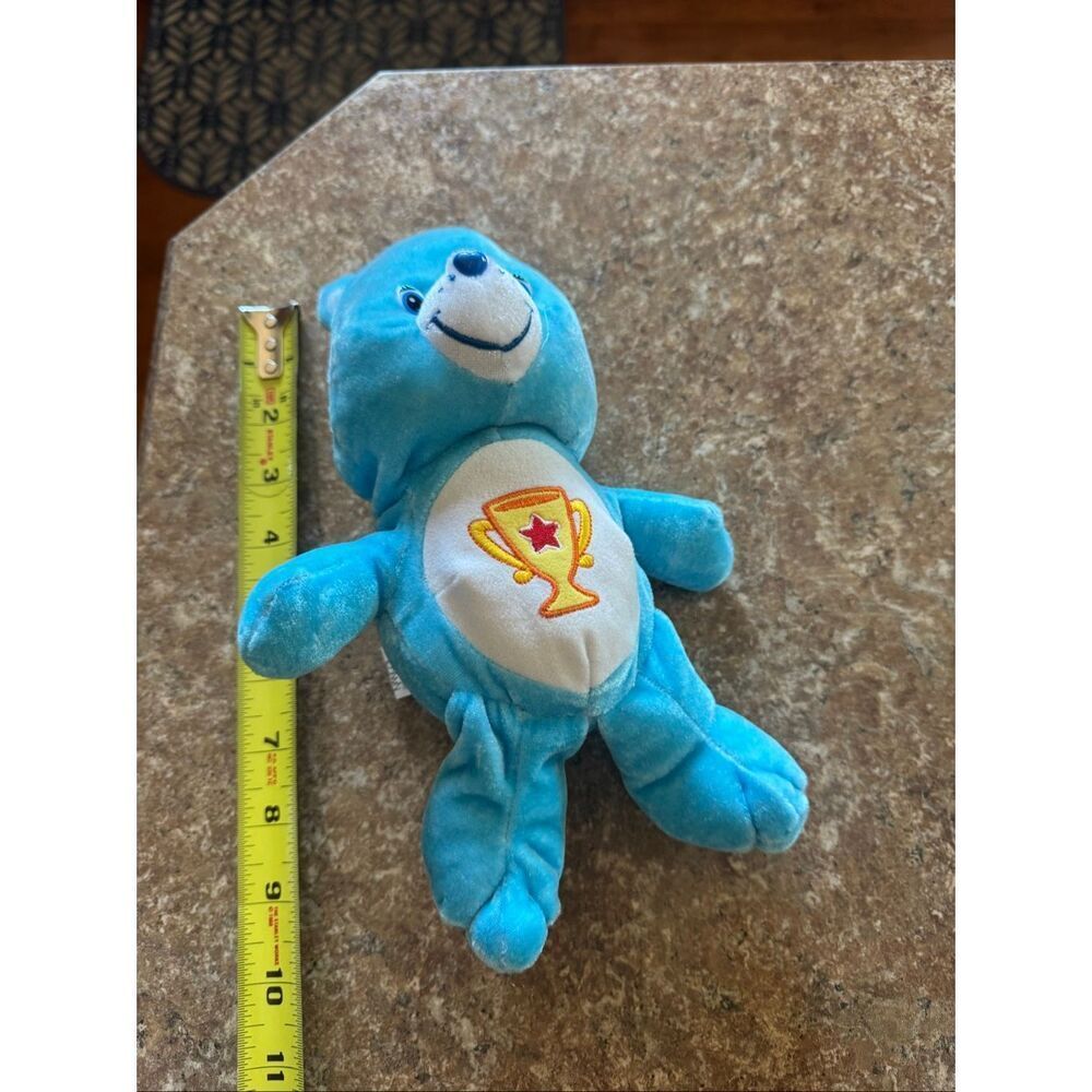 Vintage 2004 Care Bears Champion Bear Plush Blue Trophy Belly Nanco Licensed - Picture 4 of 5